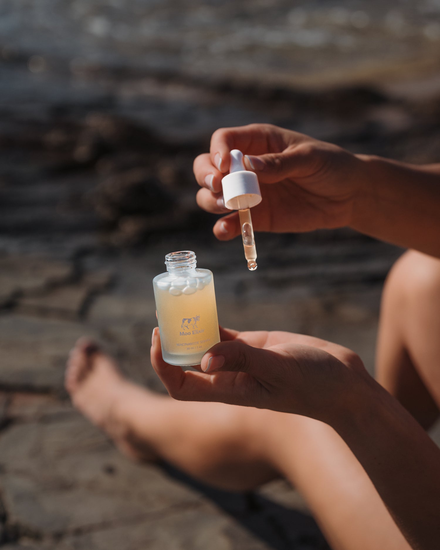 Niacinamide Serum being put on hands