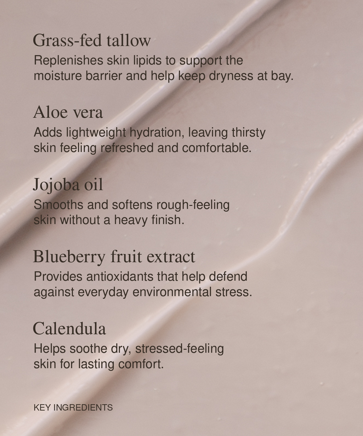 A close-up of Moo Elixir Body Butter with elegant diagonal swirled texture, featuring black text listing key ingredients including grass-fed tallow, aloe vera, jojoba oil, blueberry fruit extract, and calendula.